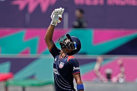 Monank Patel celebrates scoring fifty runs
